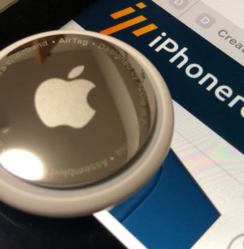 AirTag sobre un iPad con iPhoneros cargado