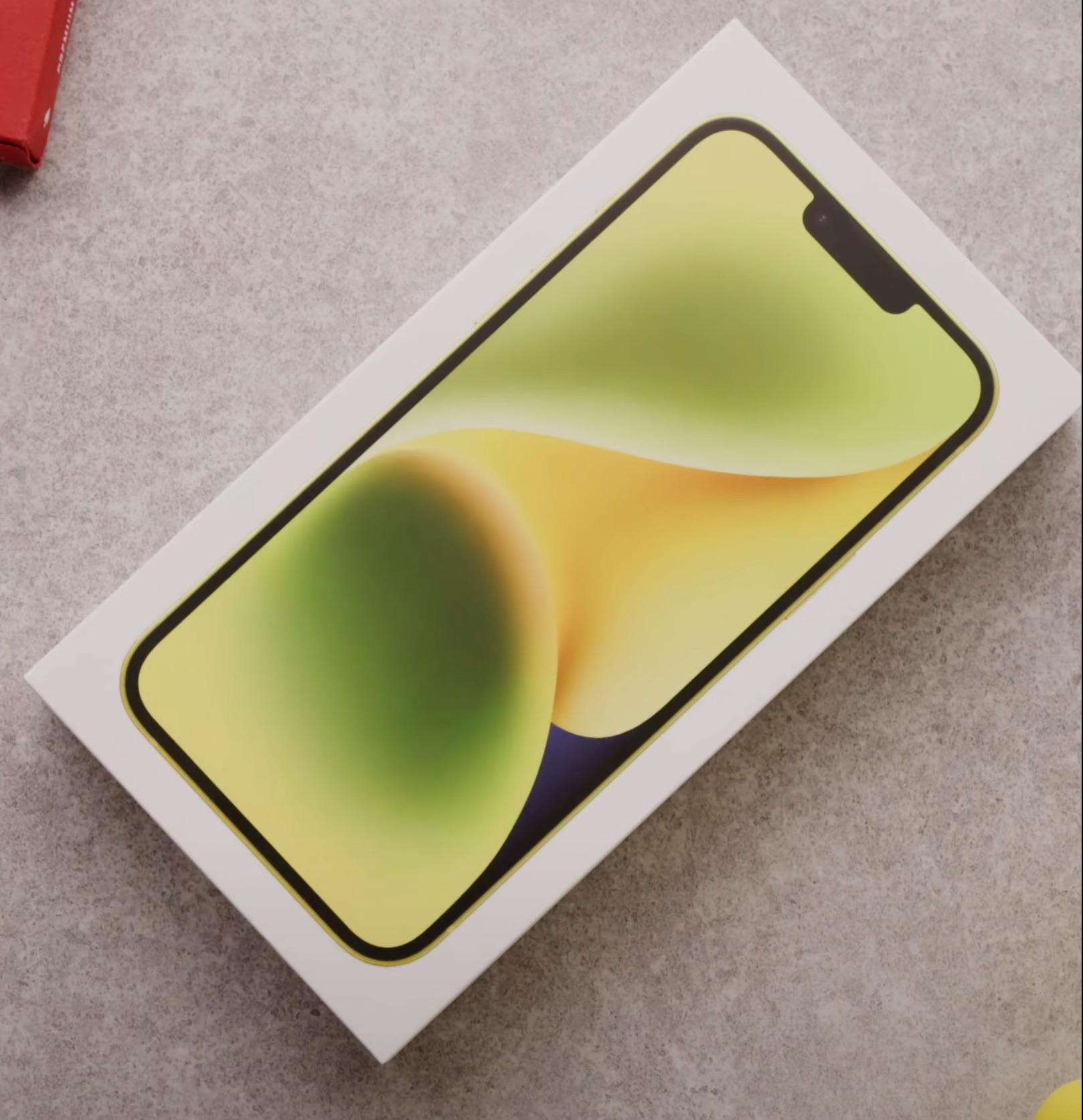 Caja del iPhone 14 Plus amarillo