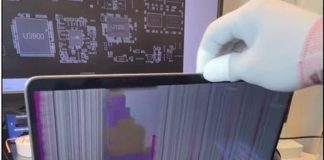 MacBook mostrando el problema de la pantalla rota debido a un cable flex dañado con polvo