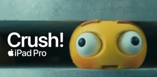 Aplastando un emoji de plastilina en un anuncio de Apple