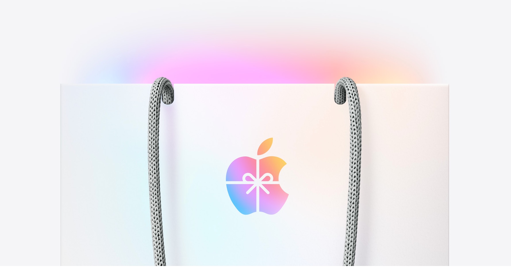 Bolsa de Apple con su logo ataviado con lazos de paquetes de regalos