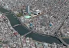 Apple Maps en el modo Flyover sobre las cercanías del río Sumida en Tokio, con el barrio de Ryogoku conocido por su estadio de Sumo al otro lado